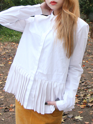 pleated white blouse
